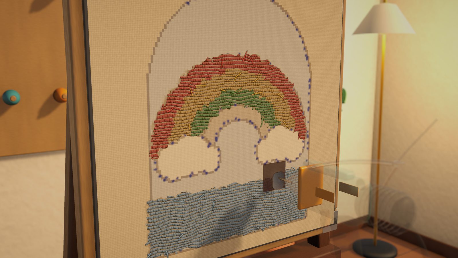 The tufting gun working a rainbow arch on the frame